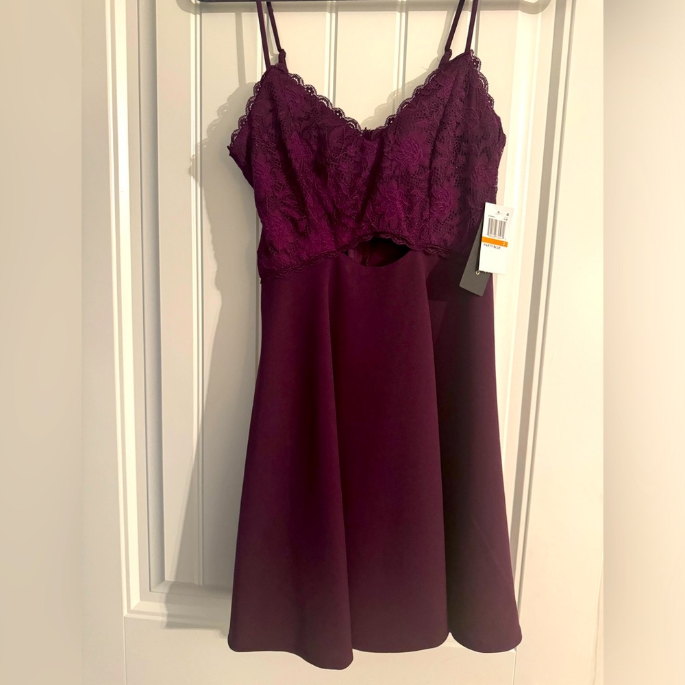 Teens Dress Size 3. New with Tag. A little stretchy.
